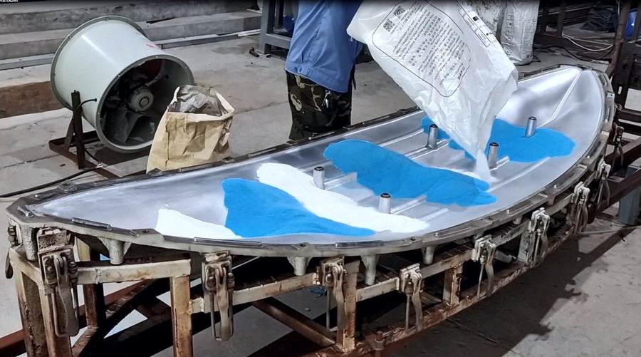 Pouring polyethylene into a kayak mold