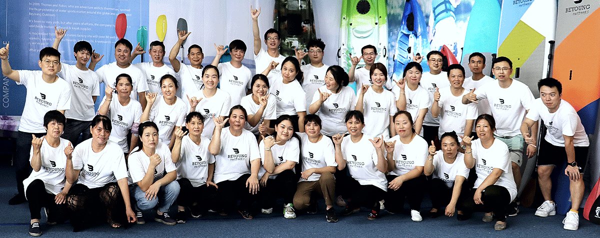 The Beyoung team in front of the factory
